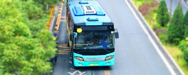 摄图网_501193267_马路上的一辆蓝色的公交车大巴车（企业副本.jpg